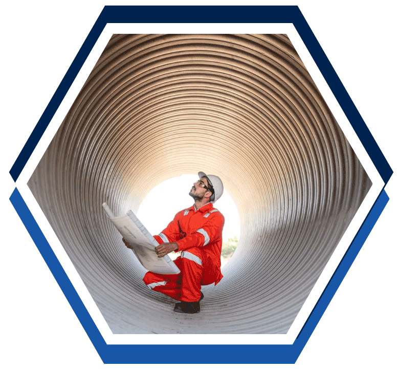 Engineer project managing an industrial pipeline project